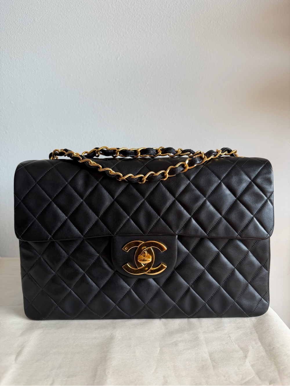CHANEL Black Quilted Shoulder Bag with Gold Chain & CC Lock
